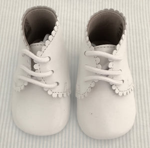 Scalloped baby shoe